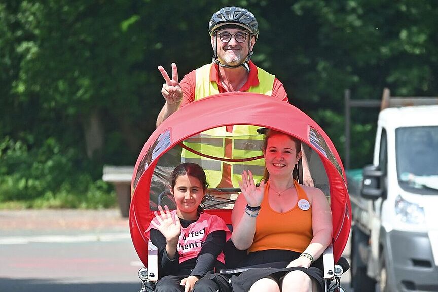 aufsteigen 2025-01 Eine Rikscha-Fahrt macht gute Laune